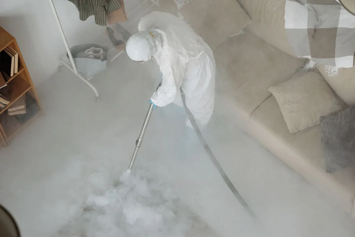 Biohazard cleanup technician in protective equipment, Ansonia, CT